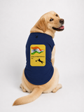 A yellow Labrador Retriever sitting and wearing a navy blue dog t-shirt with a yellow 'Happy Independence Day' graphic featuring the Indian flag and a black silhouette of a dog.